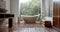 General view of bathroom with bathtub and window, slow motion