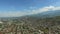 A general view of the city of Cali Valle del Cauca, Colombia in the mist at sunset. Aerial video. 