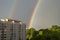 General view of a large bright double rainbow over the city.