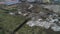 General view of a pile of construction debris plastic lie near the road illegal dump view from a drone