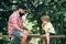 Generations. Father and Son Playing Chess. Chess. Father teaching his son to play chess.