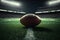 Generative AI of american football ball on field with stadium lights