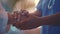 Generative AI Close up of african american doctor and senior caucasian patient holding hands business concept.