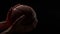 Generative AI Close up of basketball ball in athlete hands isolated on black background with copy space business c