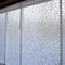 Generative AI fantasies on the theme Pattern freezing has done the frost on glass,in window.The Pattern white silvery background.