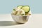 Generative AI. A frosted cold white ceramic bowl with vegan cucumber pickle ice cream balls on a beige table with a light blue