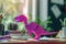 Generative AI Image of Cute Purple Dinosaur From Origami Craft on Office Desk