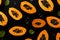Generative AI Image of Papayas Fruit Slices Pattern on Dark Background