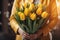 Generative AI International Women's Day. A woman in a yellow raincoat holds a lush bouquet of yellow tulips