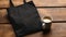 Generative AI, Realistic black tote canvas fabric bag set-up in at cafe