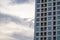 Generic building condominium blue cloudy sky