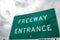 Generic Freeway Entrance sign with a grey sky