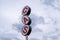 Generic gas station sign against a cloudy sky