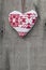 Generic machine made Christmas heart ornament on rustic style ba