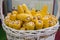 Genetically modified corn in basket at agricultural exhibition