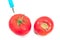 Genetically modified tomato and organic tomato isolated on whi