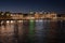 Geneva lakefront lights reflecting in Lake Geneva at night