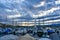 Geneva, Switzerland 8 September 2023: Moored and covered boats at marina at Lake Geneva on a sunny winter day at Swiss City of