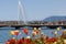 GENEVA, SWITZERLAND - APRIL 22, 2019: View at Mont-Blanc bridge and Jet dâ€™eau on Geneva lake in Geneve