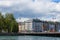 Geneva, Switzerland - June 17, 2016: Lake, Embankment, flags, bridge
