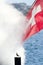 Geneva Switzerland,Seagulls play in the steam of a boat that will leave on Lake Geneva