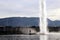 Geneva in winter Water jet deau Water Fountain and mountain Mont Saleve 