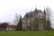 Genhoes Castle in Oud Valkenburg in the early spring fields