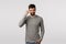 Genius, mindful shopping, good choice. Attractive and sassy, confident macho man with beard in grey sweater, tap temple