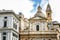 Genoa, Italy, 10/04/2019: A beautiful temple of old architecture in the historic center of a European city against a bright blue