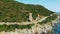 The Genoese tower of Osse in the green countryside on the steep rocks