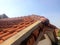 Genteng is traditional roof from Indonesia. Genteng press as the roof of a house made of clay. Stack of tiles, Genteng Indonesia