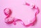 Gentle background with pink silk ribbon, rose flowers, Internati