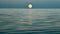 The gentle lapping of the water highlighted by the moons silvery reflection evoking a sense of peace and tranquility. .