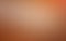 Gentle peach background. Orange gradient blurred pastel color