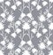 Gentle seamless pattern from the silhouettes of white flowers on a light gray background. China style.