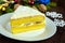 Gentle sponge cake with creamy banana layer, sprinkle coconut