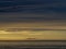 Gentle sunset. North Devon coast with horizon, sea and sky.