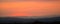 Gentle Sunset Panorama over distant Mountains