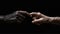 gentle touch of hands .feelings shown by hands on a black background