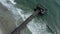 Gentle waves break around fishing pier on Tybee Island