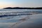 Gentle waves on Carmel Beach at sunset