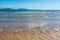 Gentle waves on sandy beach of Anglesey and mountains of Snowdonia - 4