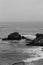 Gentle Waves Swirl Around Rocks Near an Elephant Seal Beach
