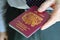 Gentleman handing over his British passport