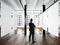 Gentleman Modern museum expo loft interior.Open space studio.Empty white canvas hanging.Wood floor,bricks wall,panoramic