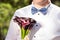 GENTLEMAN IN THE WHITE SHIRT WITH A BUTTERFLY, WITH COLORS IN HANDS