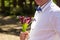 GENTLEMAN IN THE WHITE SHIRT WITH A BUTTERFLY, WITH COLORS IN HANDS