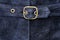 Genuine blue sude texture with a belt and buckle