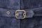 Genuine blue sude texture with a belt and buckle