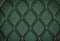 Genuine leather upholstery background for a decoration in green tones